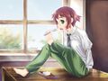 Rin eating in an empty classroom