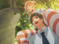 Hisao and Emi picking apples