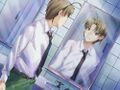 Hisao looking at himself in the mirror